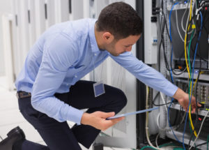 Technician Working on a Server
